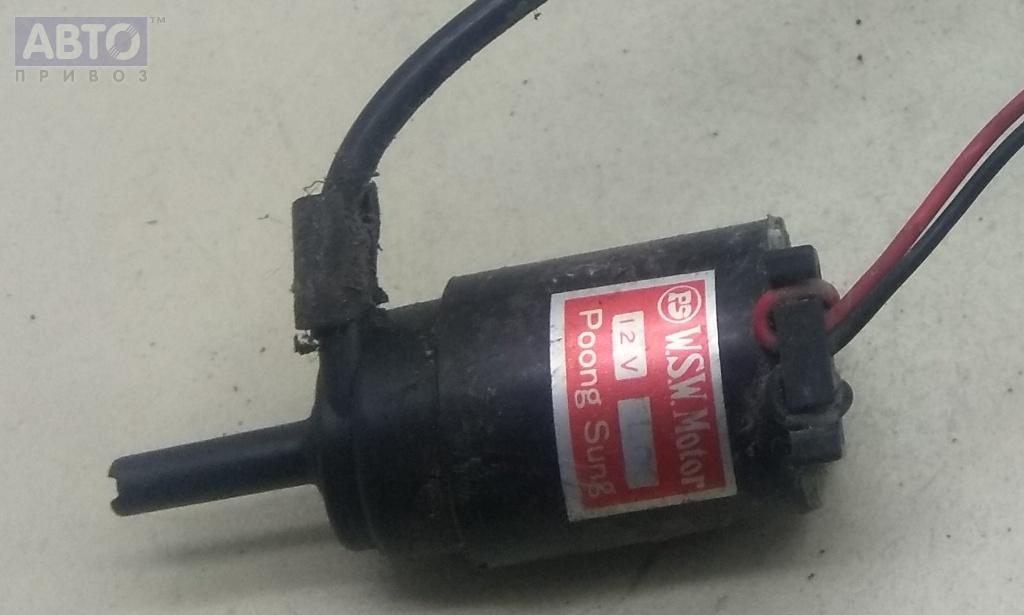 Где находится моторчик омывателя лобового стекла дэу нексия - фото