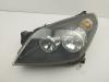 Фара левая Opel Astra H (2004-2009) Артикул 55256030 - Фото #1