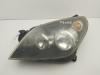 Фара левая Opel Astra H (2004-2009) Артикул 55292100 - Фото #1