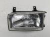 Фара левая Volkswagen Transporter T4 Артикул 55219979 - Фото #1